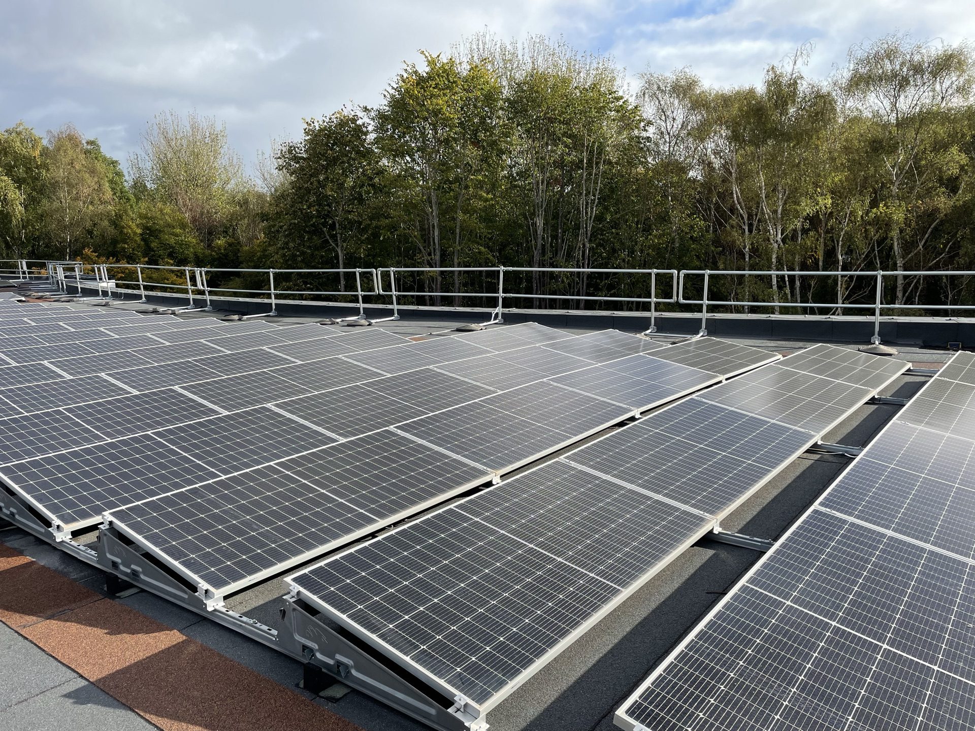 Commercial rooftop solar array on a UK industrial unit