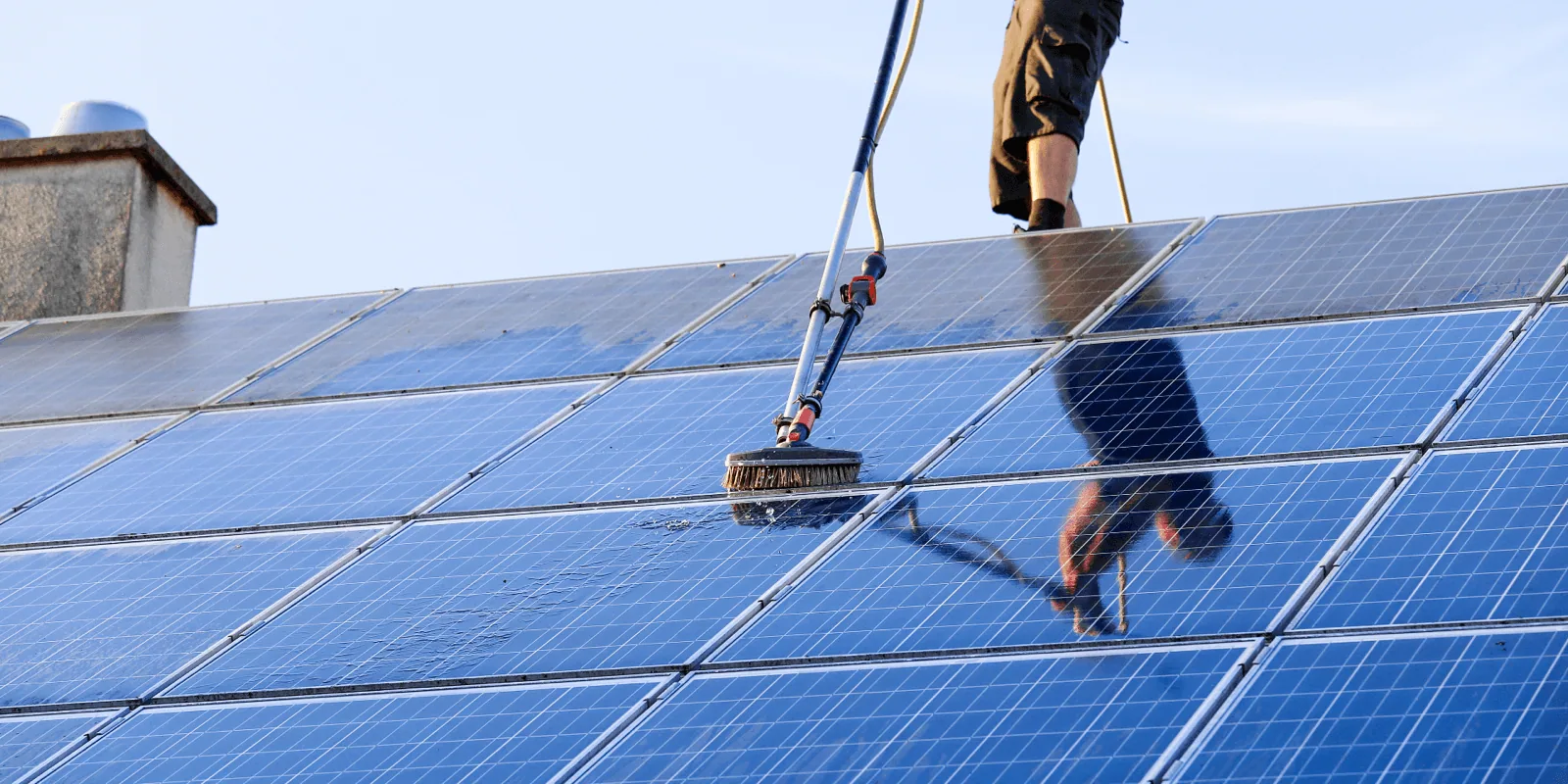 Engineers performing solar PV maintenance